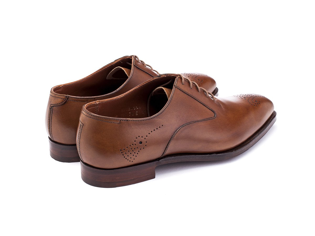 Back angle view of Crockett & Jones Rosemoor medallion brogue oxford shoes in tan antique calf