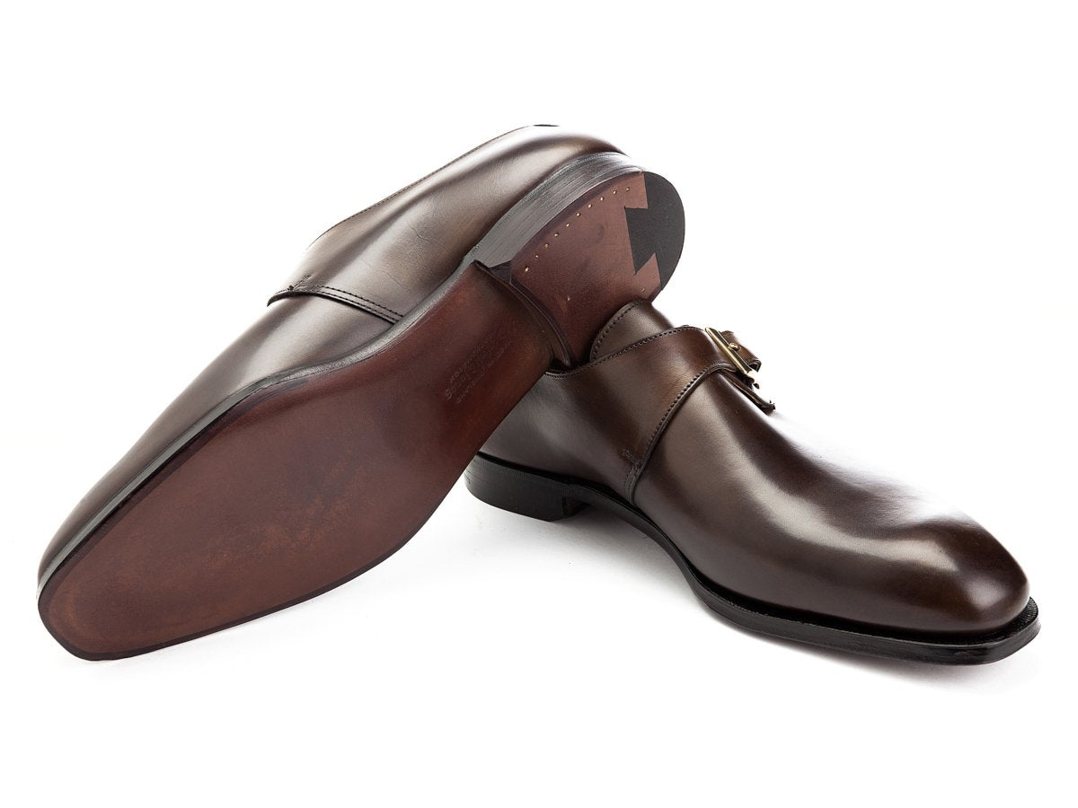 Leather sole of Crockett & Jones Savile plain toe single monk strap shoes in dark brown antique calf