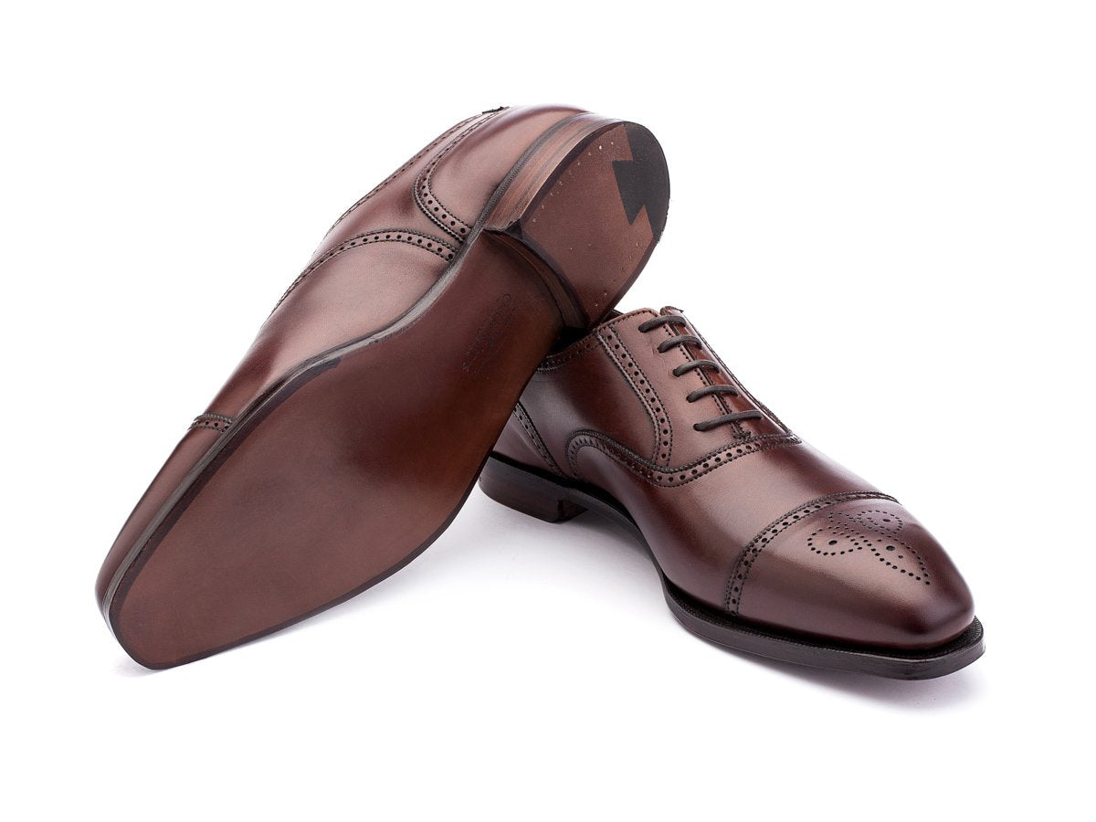 Leather sole of Crockett & Jones Selborne half brogue oxford shoes in chestnut antique calf