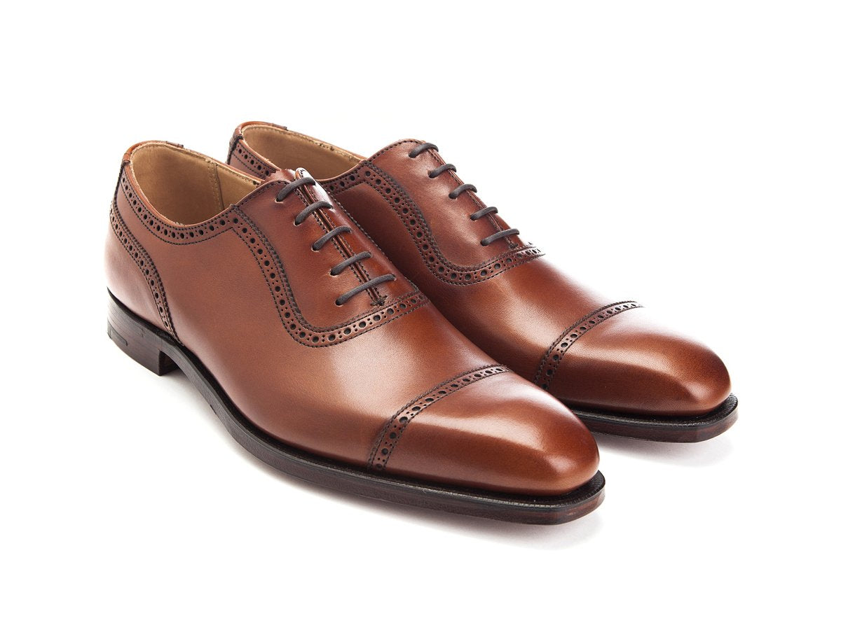 Front angle view of Crockett & Jones Westbourne adelaide brogue oxford shoes in chestnut burnished calf