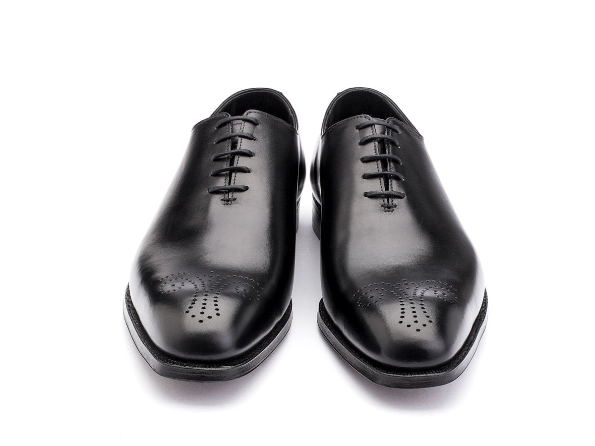 Front view of Crockett & Jones Weymouth wholecut medallion oxford shoes in black calf