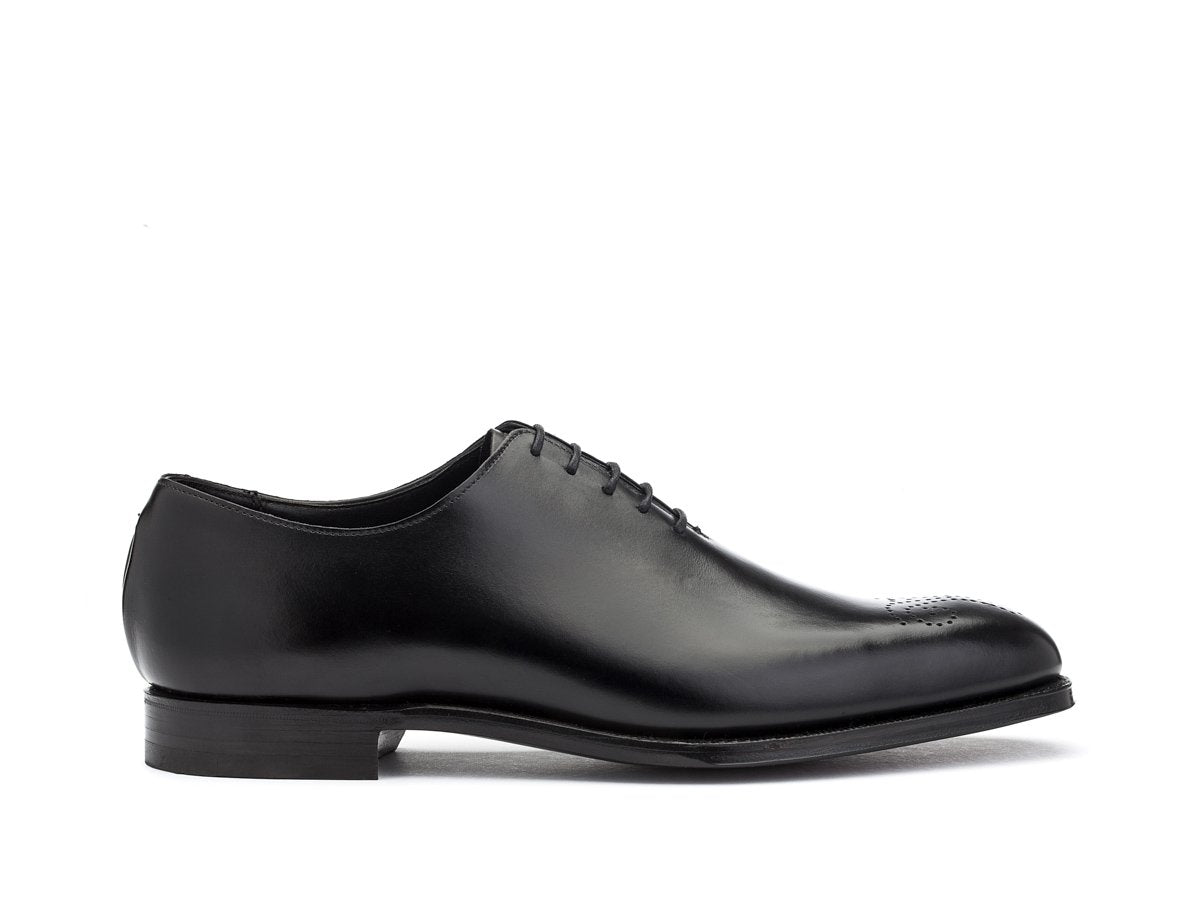 Side view of Crockett & Jones Weymouth wholecut medallion oxford shoes in black calf