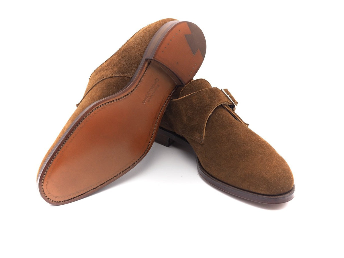 Leather sole of Crockett & Jones Woollahra plain toe single monk strap shoes in tobacco suede
