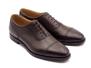 Front angle view of Crockett & Jones Macquarie 2 adelaide brogue oxford shoes in dark brown burnished calf