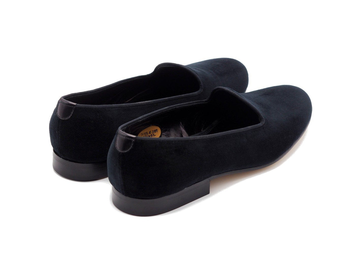Back angle view of Edward Green Albert slippers in black velvet