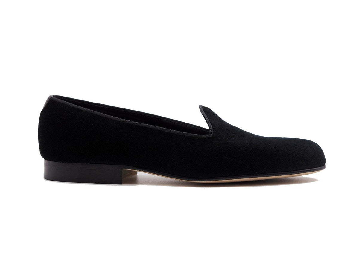 Side view of Edward Green Albert slippers in black velvet