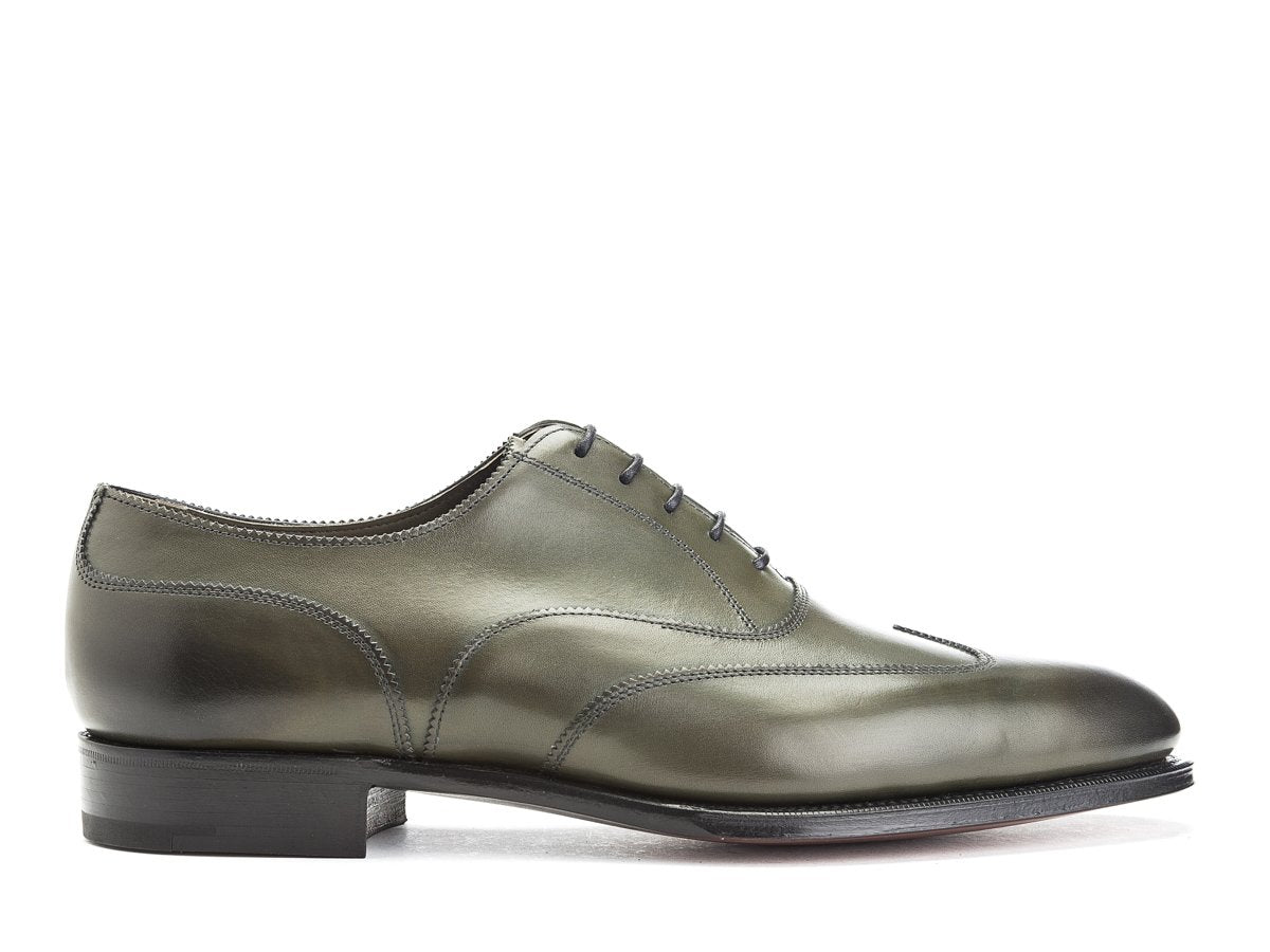 Side view of Edward Green Beaulieu austerity wingtip brogue oxford shoes in olive antique calf