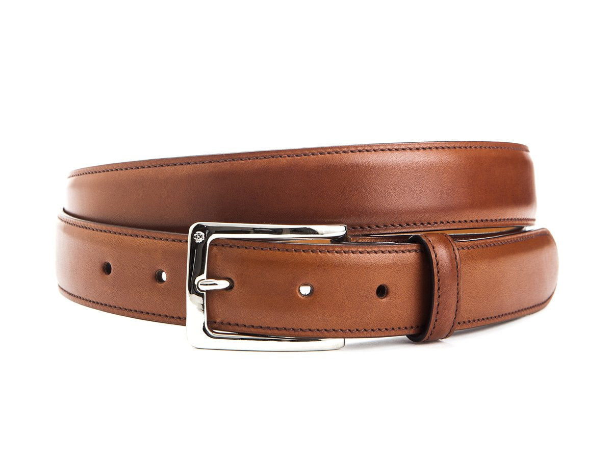 Front view of Edward Green chestnut antique belt with nickel buckle