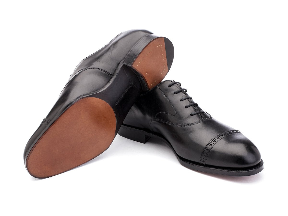 Leather sole of F width Edward Green Berkeley quarter brogue oxford shoes in black calf