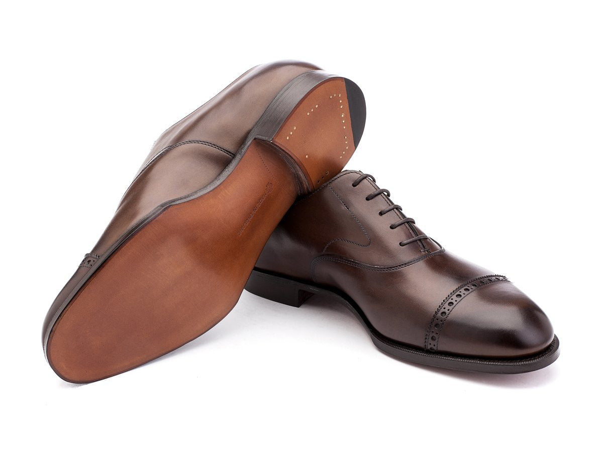 Leather sole of F width Edward Green Berkeley quarter brogue oxford shoes in dark oak antique calf
