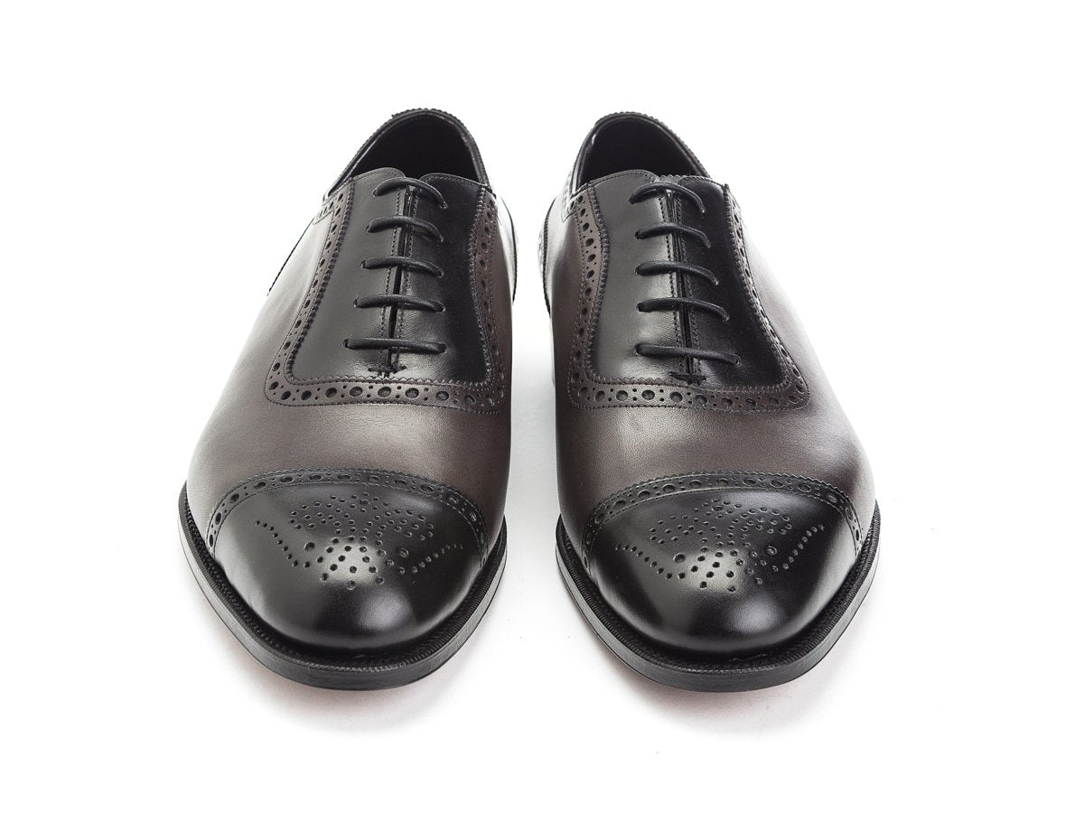 Front view of Edward Green Canterbury adelaide brogue oxford shoes in black and cloud antique calf