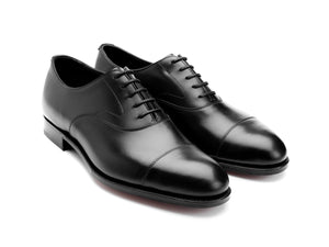 Front angle view of D width Edward Green Chelsea 202 plain captoe oxford shoes in black calf