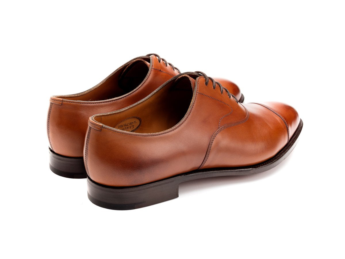 Back angle view of Edward Green Chelsea 202 plain captoe oxford shoes in chestnut antique calf