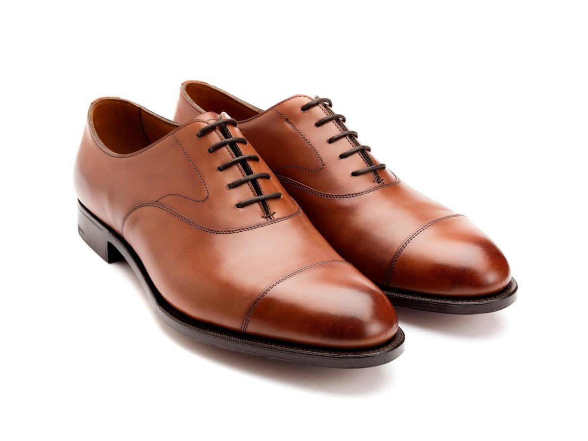 Front angle view of Edward Green Chelsea 202 plain captoe oxford shoes in chestnut antique calf