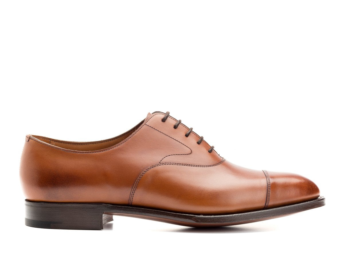 Side view of Edward Green Chelsea 202 plain captoe oxford shoes in chestnut antique calf