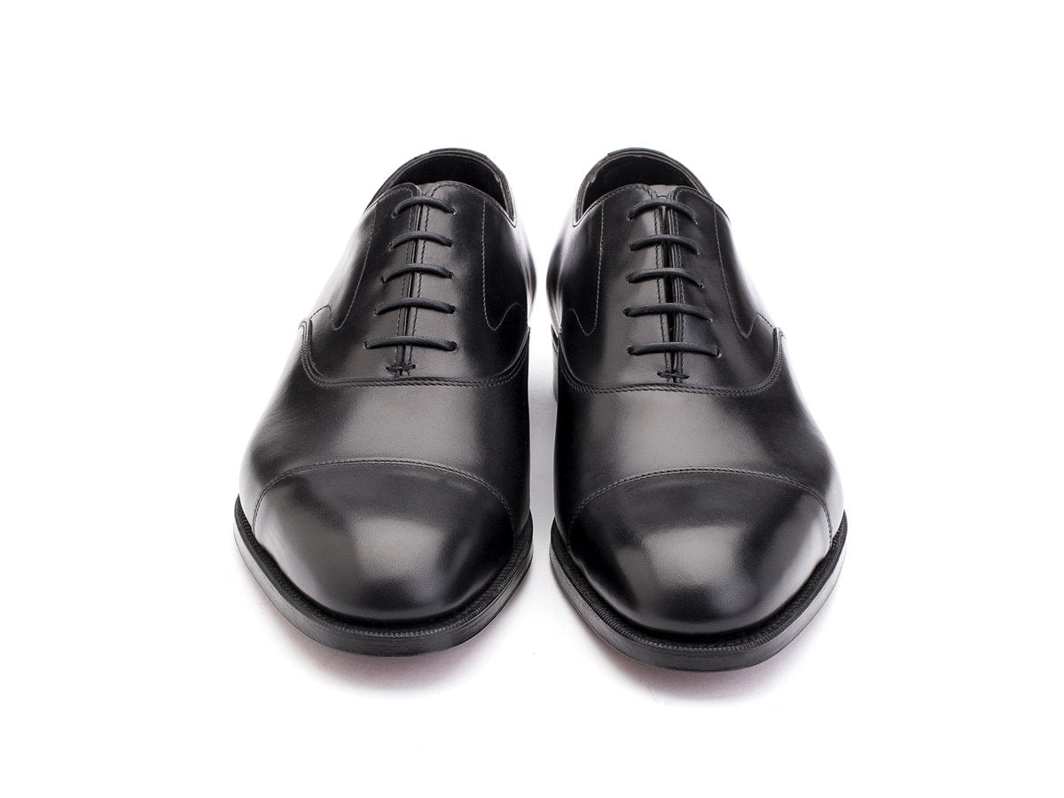 Front view of F width Edward Green Chelsea plain captoe oxford shoes in black calf