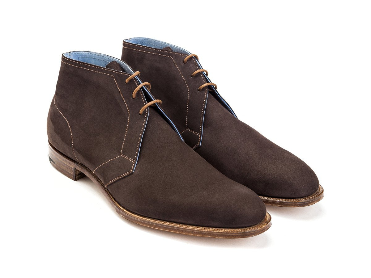 Front angle view of Edward Green Cherwell chukka boots in chocolate nubuck