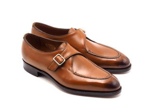 Front angle view of Edward Green Clapham split toe single monk strap shoes in chestnut antique calf