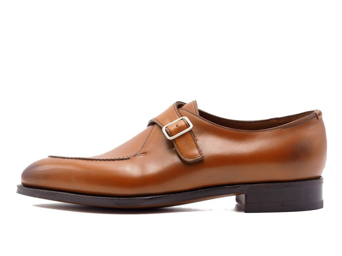 Side view of Edward Green Clapham split toe single monk strap shoes in chestnut antique calf