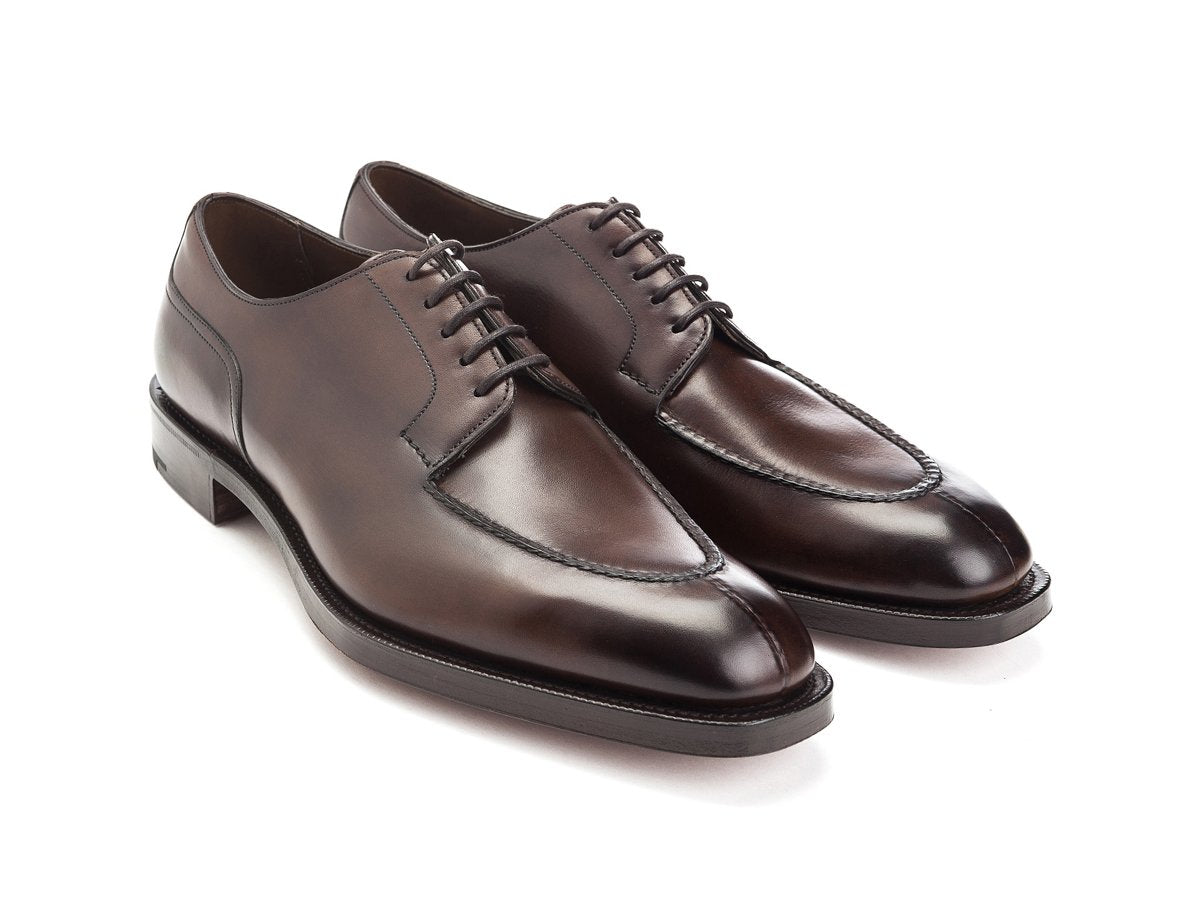 Front angle view of Edward Green Dover split toe derby shoes in dark oak antique calf