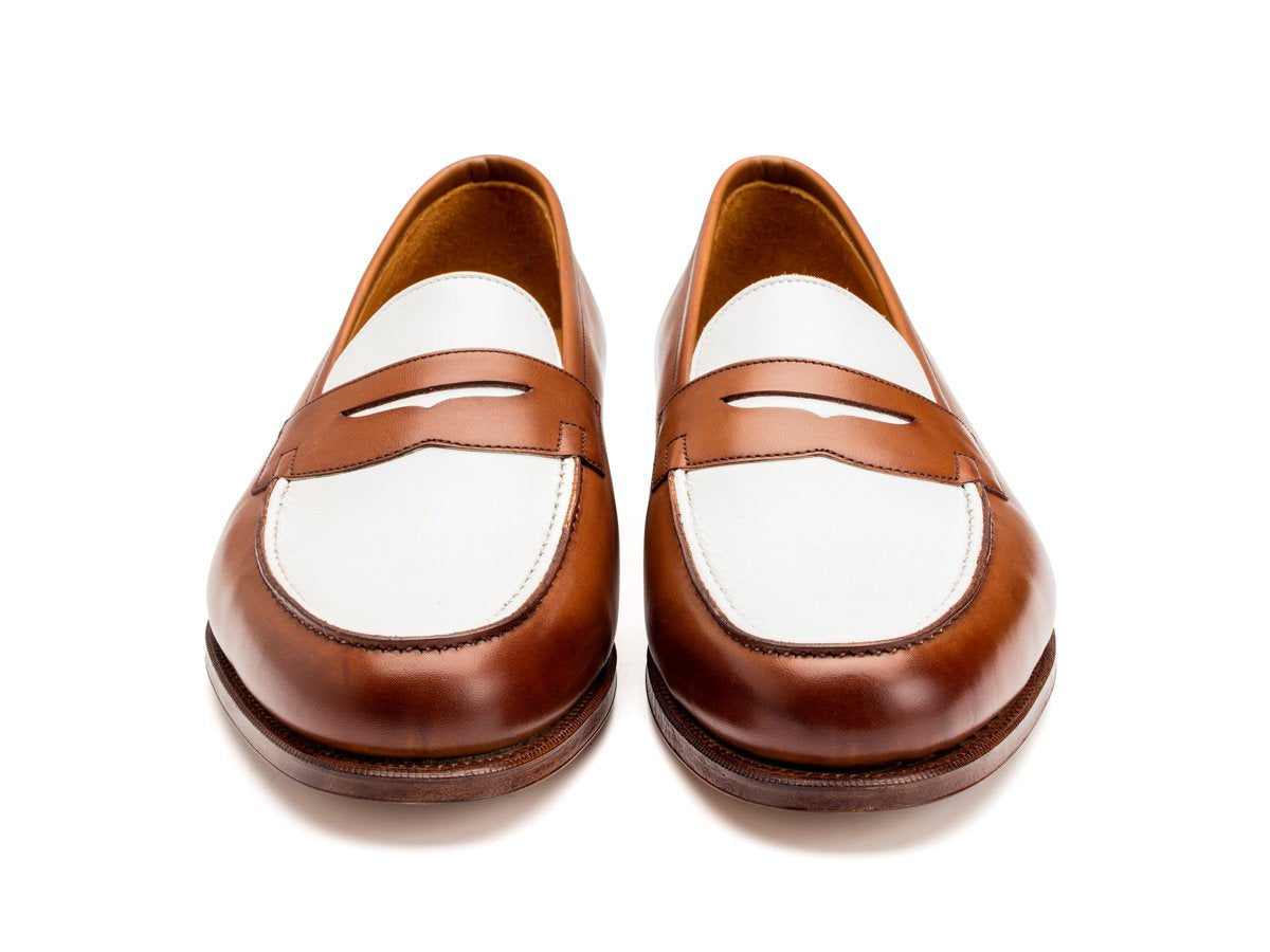 Front view of Edward Green Duke spectator penny loafers in hazel and white calf