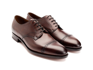 Front angle view of Edward Green Elmsley quarter brogue derby shoes in dark oak antique calf