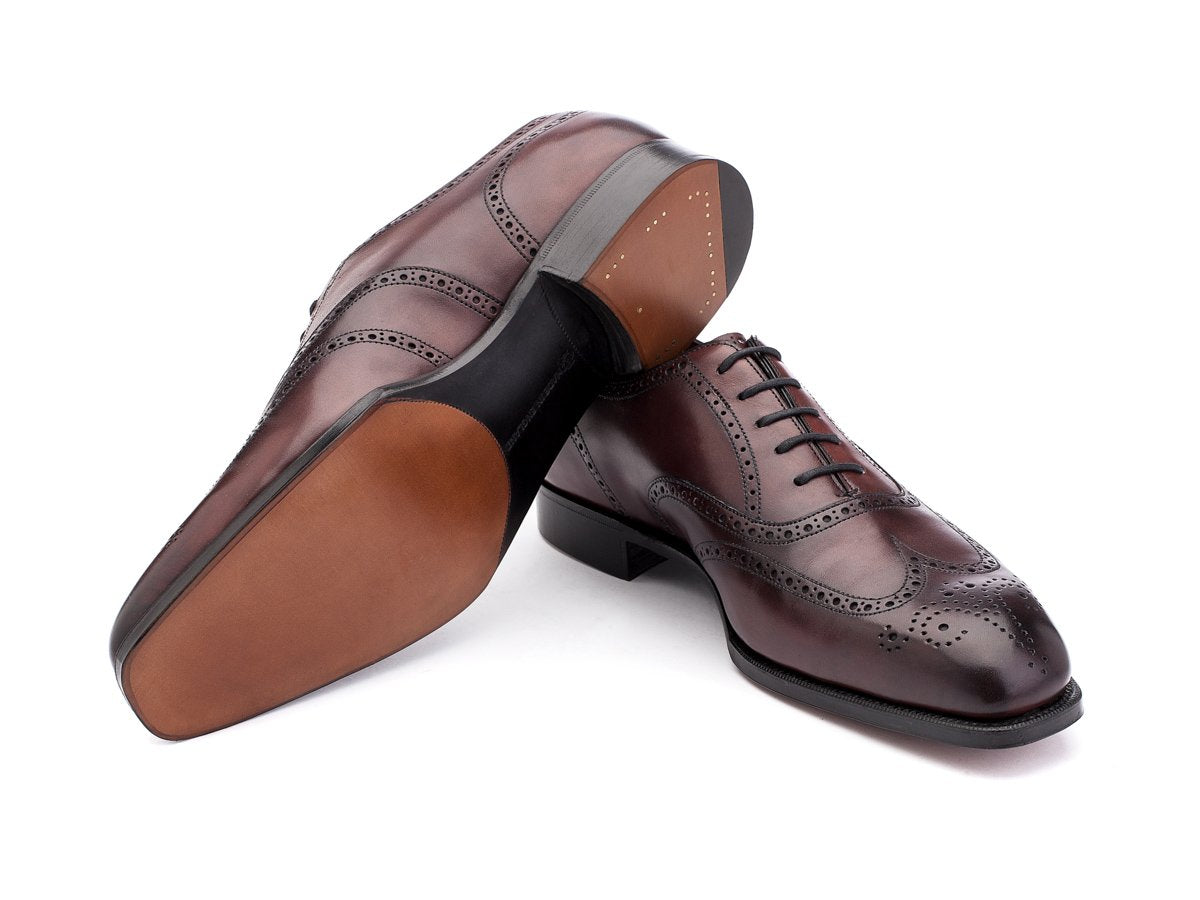 Leather sole of Edward Green Inverness wingtip full brogue oxford shoes in burgundy antique calf