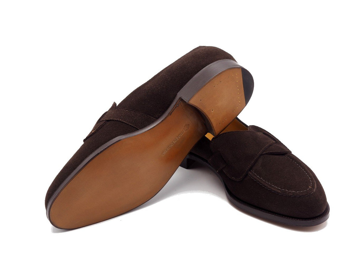 Leather sole of Edward Green Lulworth butterfly strap loafers in espresso suede