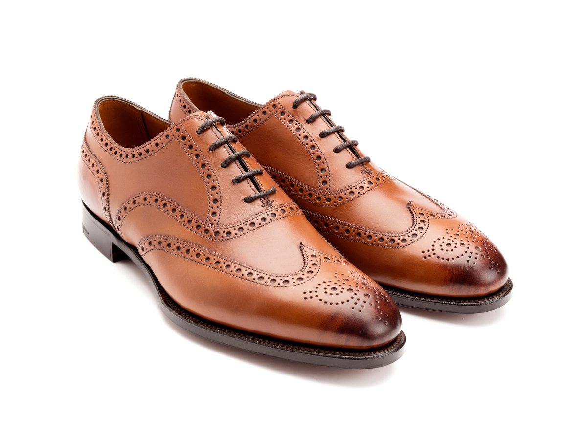 Front angle view of Edward Green Malvern wingtip full brogue oxford shoes in chestnut antique calf