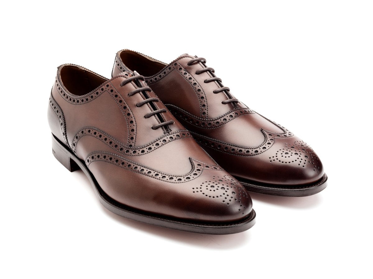 Front angle view of Edward Green Malvern wingtip full brogue oxford shoes in dark oak antique calf
