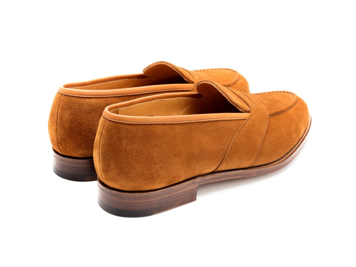 Back angle view of Edward Green Montpellier full strap penny loafer in tobacco suede