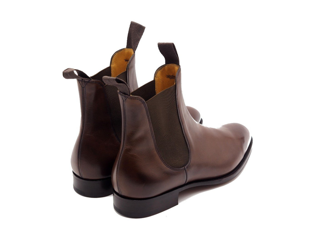 Back angle view of Edward Green Newmarket chelsea boots in dark oak antique calf