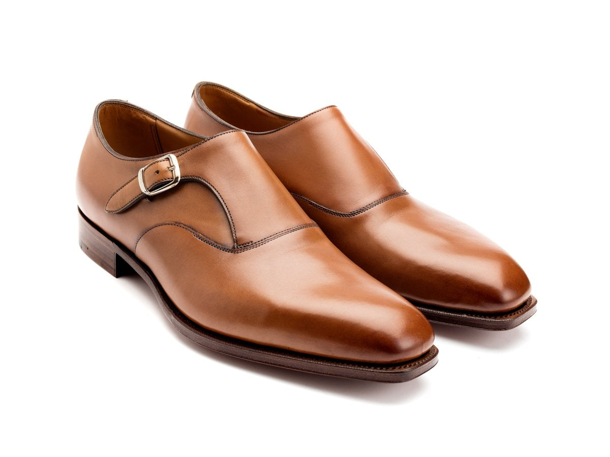 Front angle view of Edward Green Oundle single monk strap shoes in edwardian antique calf