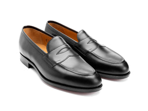 Front angle view of Edward Green Piccadilly penny loafers in black calf