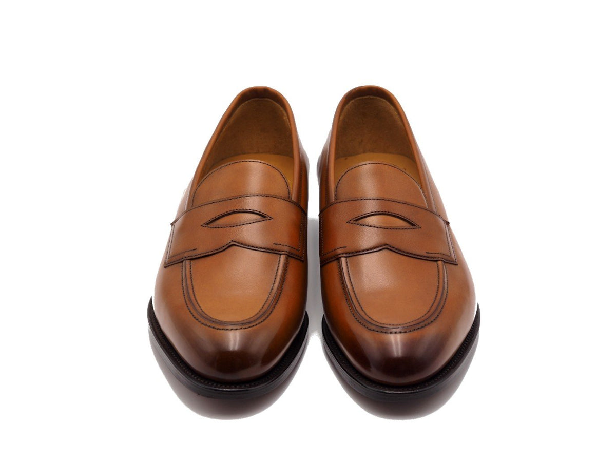 Front view of Edward Green Piccadilly penny loafers in chestnut antique calf