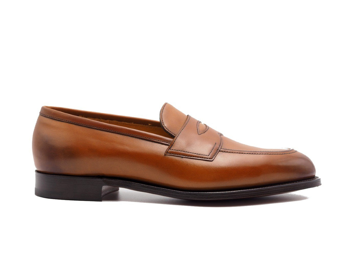Side view of Edward Green Piccadilly penny loafers in chestnut antique calf