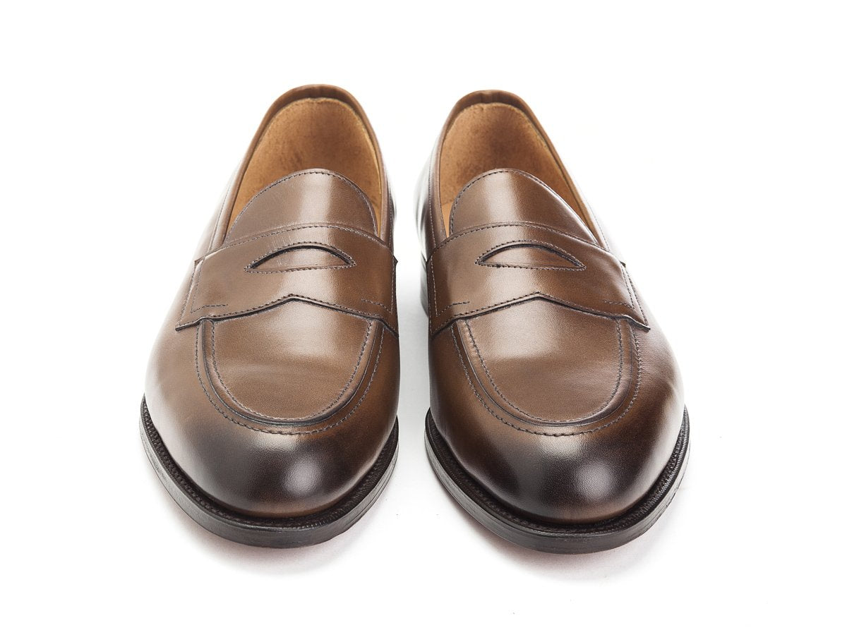 Front view of Edward Green Piccadilly penny loafers in dark oak antique calf
