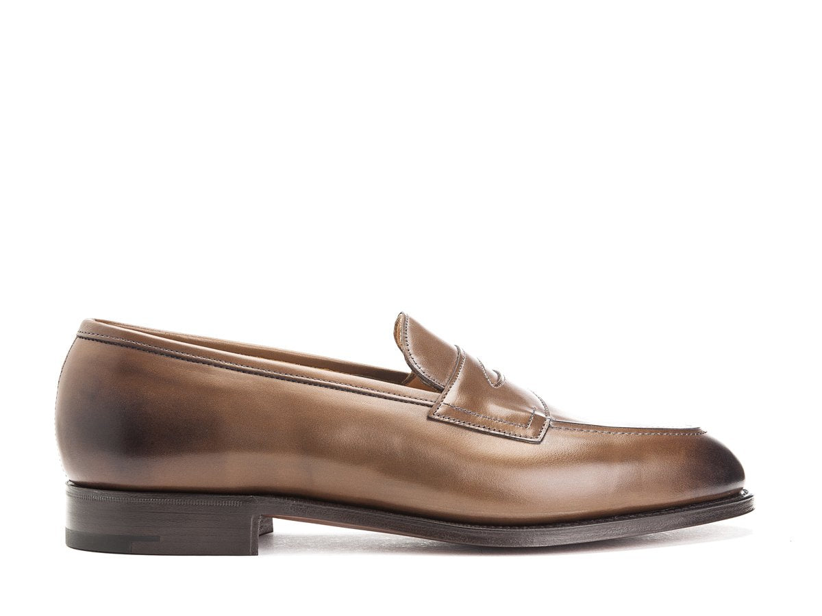Side view of Edward Green Piccadilly penny loafers in dark oak antique calf