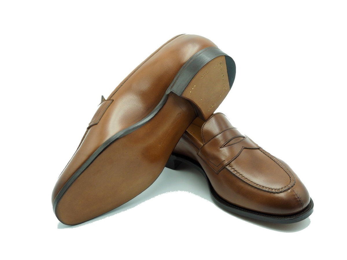 Leather sole of Edward Green Sloane split toe penny loafers in burnt pine antique calf