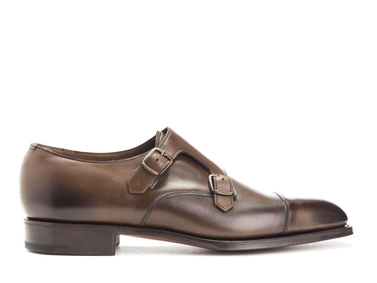 Side view of Edward Green Westminster plain captoe double monk strap shoes in dark oak antique calf