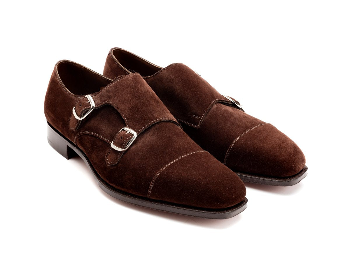 Front angle view of Edward Green Westminster plain captoe double monk strap shoes in mink suede