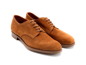 Front angle view of Edward Green Winford plain toe derby in tobacco suede