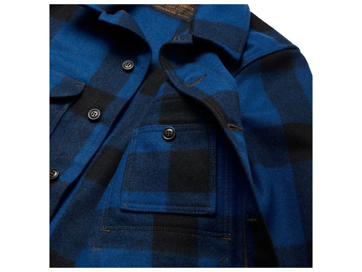 Close up view of Filson Mackinaw Cruiser jacket inner chest pocket in cobalt blue and black