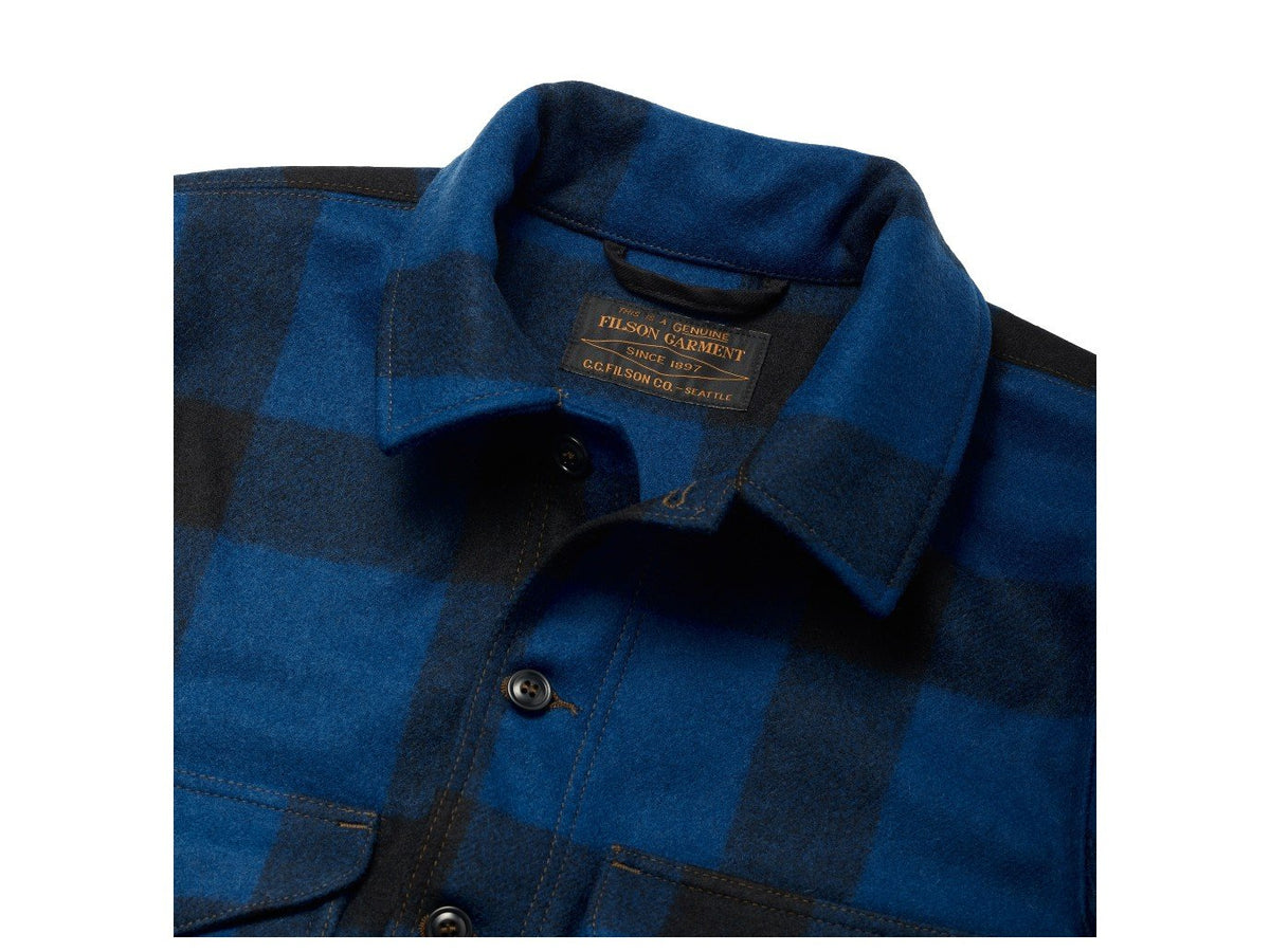 Close up view of Filson Mackinaw Cruiser jacket collar in cobalt blue and black