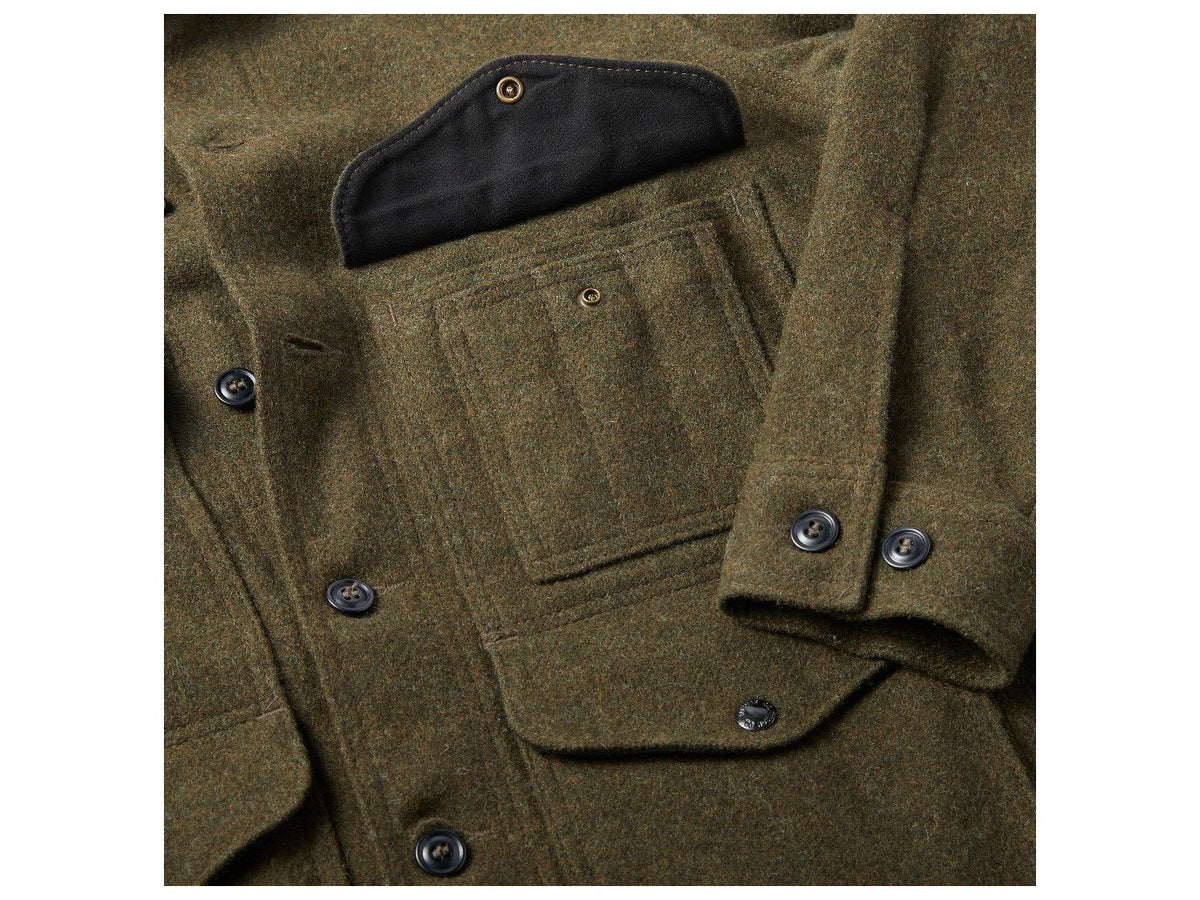 Close up view of Filson Mackinaw Cruiser jacket utility pocket in forest green
