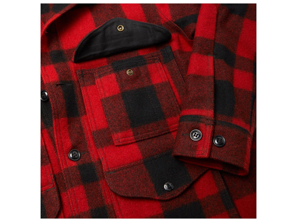 Close up view of Filson Mackinaw Cruiser jacket utility pocket in red and black