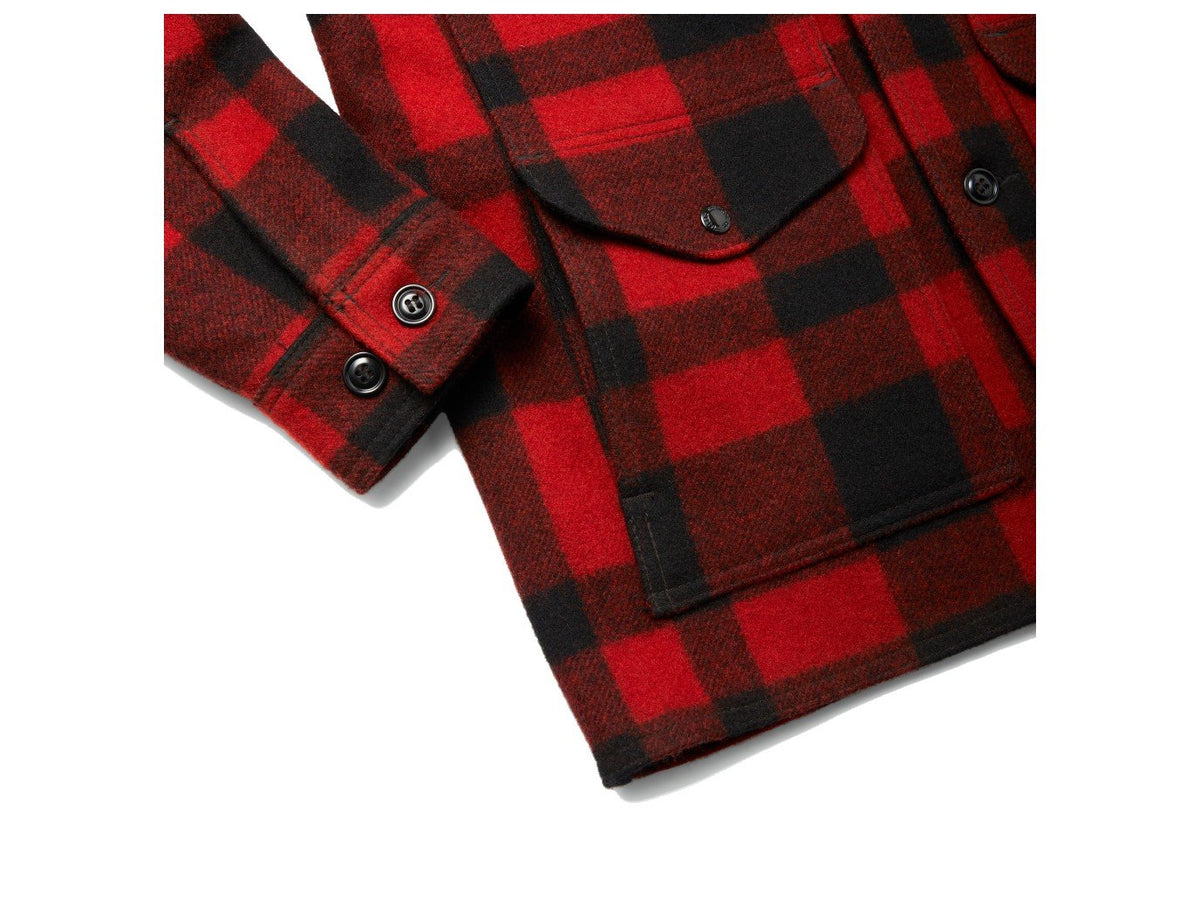 Close up view of Filson Mackinaw Cruiser jacket waist pocket in red and black