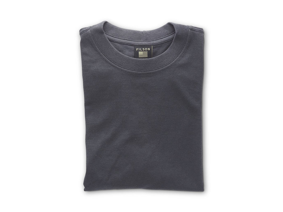 Folded Filson Pioneer T Shirt in ink blue