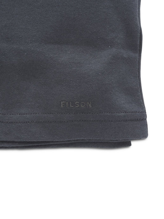 Close up view of Filson Pioneer T Shirt logo in ink blue