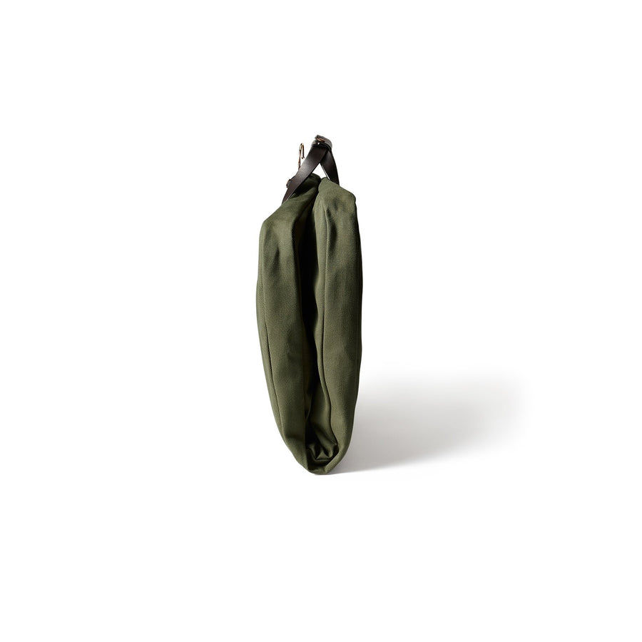 Side view of folded Filson Suit Cover bag in otter green